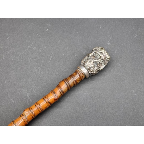 1599 - An unusual antique rootwood cane, the silver plated multi-faced terminal inscribed '146 New Bond St'... 