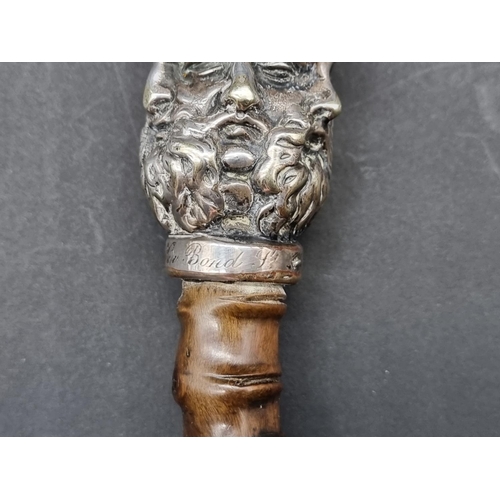 1599 - An unusual antique rootwood cane, the silver plated multi-faced terminal inscribed '146 New Bond St'... 