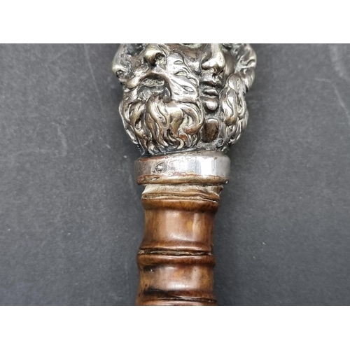 1599 - An unusual antique rootwood cane, the silver plated multi-faced terminal inscribed '146 New Bond St'... 