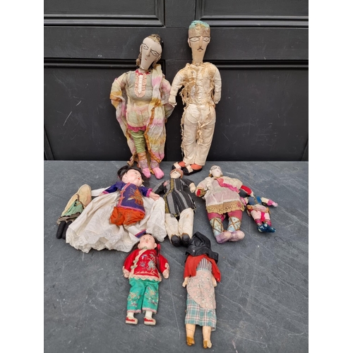 1610 - A collection of Chinese dolls and other similar dolls. (9)