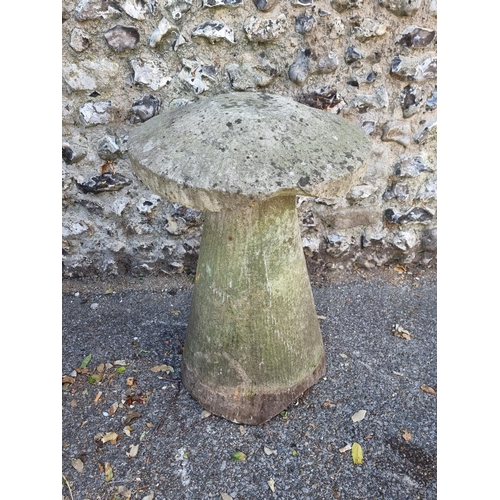 1642 - An old sandstone staddle stone, 75cm high; together with a small marble urn, 31cm high, (s.d. to bot... 