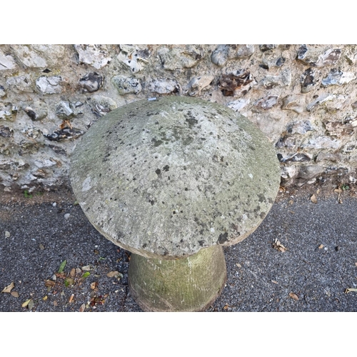 1642 - An old sandstone staddle stone, 75cm high; together with a small marble urn, 31cm high, (s.d. to bot... 