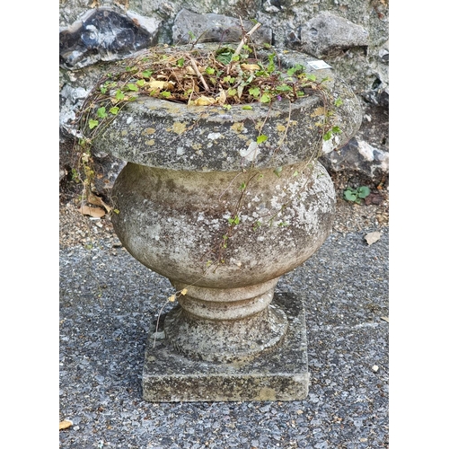 1642 - An old sandstone staddle stone, 75cm high; together with a small marble urn, 31cm high, (s.d. to bot... 