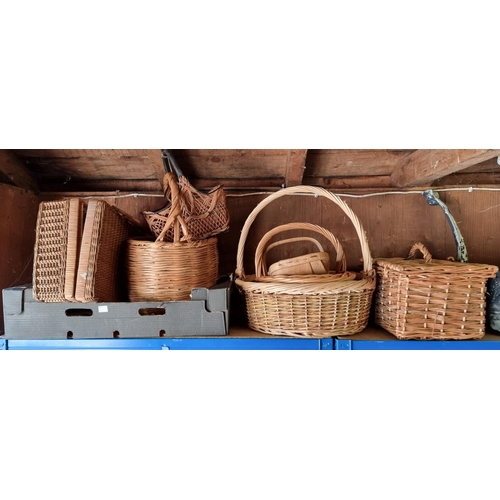 1658 - A collection of wicker baskets and trugs.