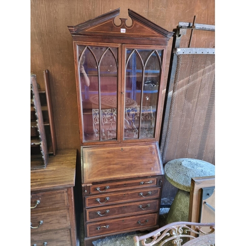 1102 - A small antique mahogany and chequer strung bureau bookcase, 72.5cm wide.