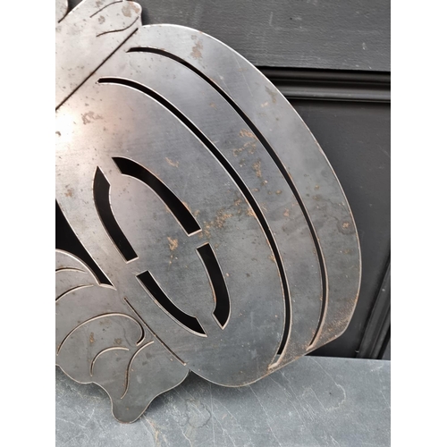 1620 - A 4mm sheet steel Michelin Man plaque, 63cm high x 76cm wide.