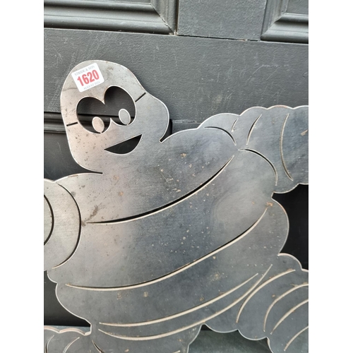 1620 - A 4mm sheet steel Michelin Man plaque, 63cm high x 76cm wide.