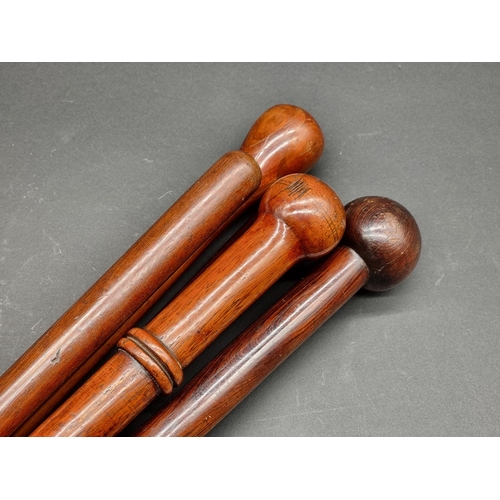 1621 - Five hardwood canes. 