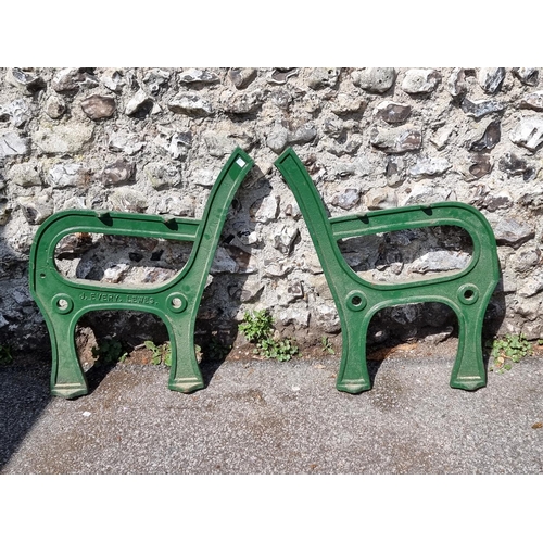 1652 - A near pair of 'J Every, Lewes' cast iron bench ends.