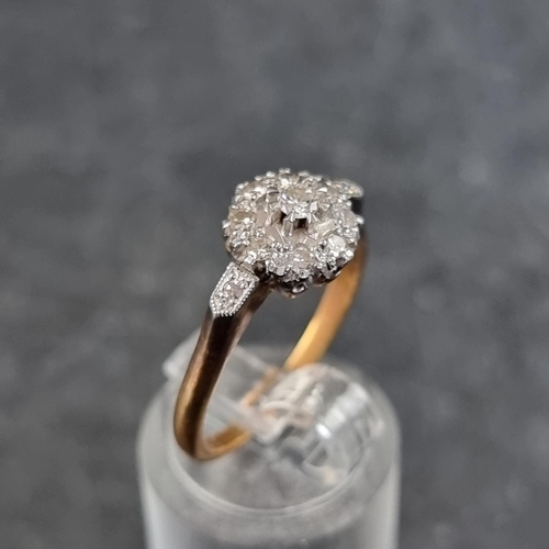 122 - An 18ct gold diamond cluster ring, set eleven diamonds, London 1965, size P 1/2, gross weight 3.5g.... 