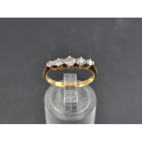 129A - A yellow metal diamond five stone ring, stamped 18ct/Plat, size M 1/2.