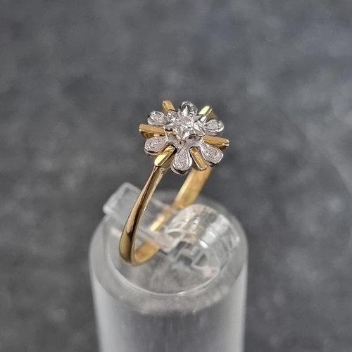 130 - An 18ct gold diamond floral cluster ring, set seven small diamonds, London 1986, size O 1/2, gross w... 