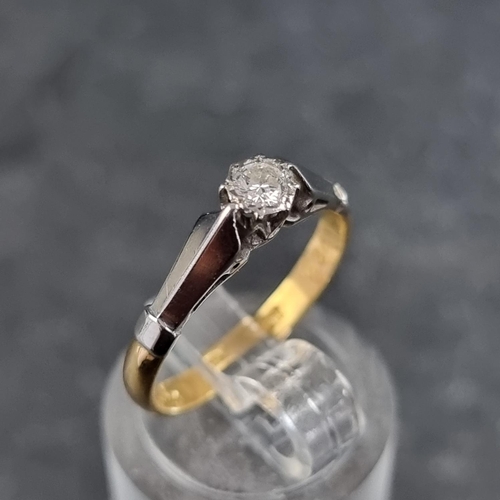 135 - An 18ct gold and platinum diamond ring, approximately 0.10ct, London1984, size L, gross weight 2.6g.... 