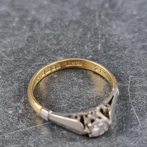 135 - An 18ct gold and platinum diamond ring, approximately 0.10ct, London1984, size L, gross weight 2.6g.... 