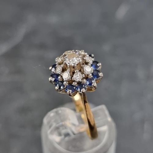 147 - An 18ct gold diamond and sapphire cluster ring, set nine diamonds and twelve sapphires, London 1966,... 