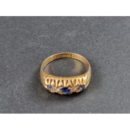 154A - An 18ct gold diamond and sapphire five stone ring, Birmingham 1921, size M 1/2, gross weight 2.4g.... 