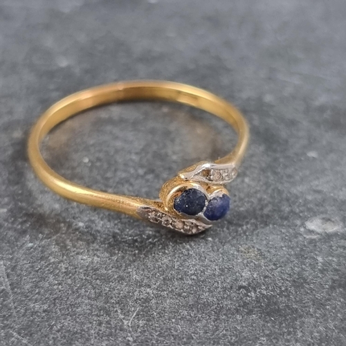 161 - An 18ct gold diamond and sapphire crossover ring, size T 1/2, gross weight 2.4g; together with a yel... 