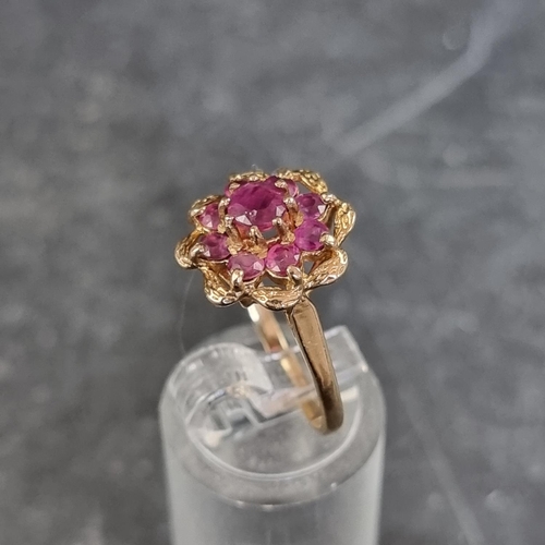 164 - A 9ct gold pink topaz cluster ring, size P, gross weight 3g.