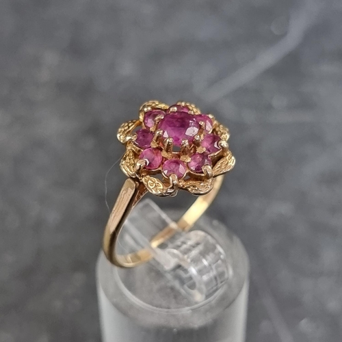 164 - A 9ct gold pink topaz cluster ring, size P, gross weight 3g.