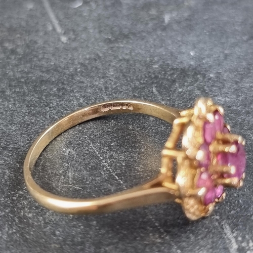 164 - A 9ct gold pink topaz cluster ring, size P, gross weight 3g.