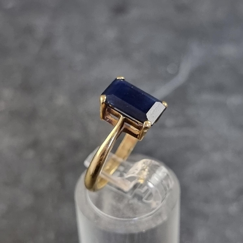 167 - An 18ct gold sapphire ring, approximately 2.5ct, by H Ltd, London 1986, size K, gross weight 3.4g.... 