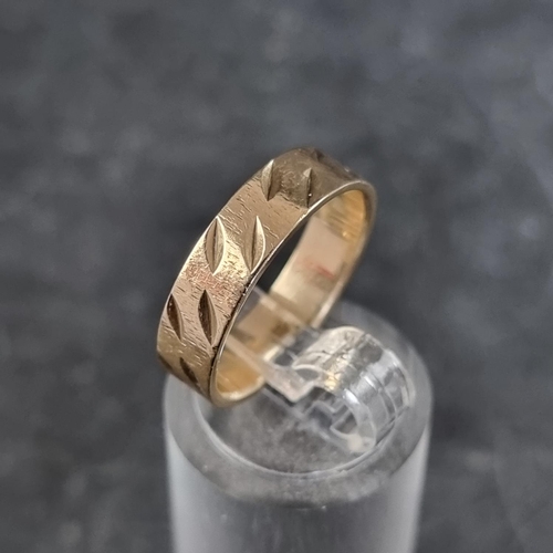 177A - A 9ct gold wedding band, 3g.