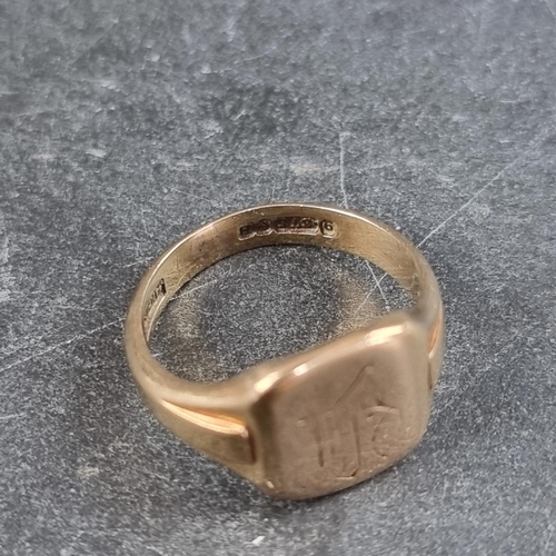 179 - A 9ct gold signet ring, engraved initials, size K 1/2, 4.2g.