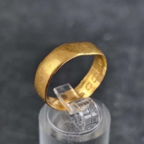 180 - A 22ct gold wedding band, 4.2g