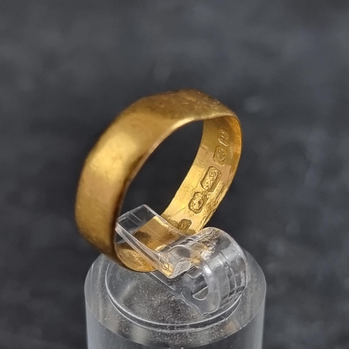 180 - A 22ct gold wedding band, 4.2g