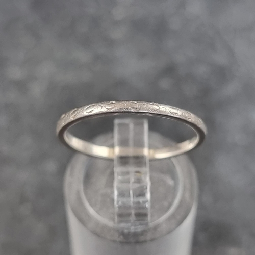 191 - A wedding band, stamped platinum, 2.4g