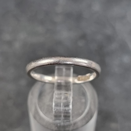 192 - A wedding band, by H G & S, stamped Plat and Fidelity, size M.