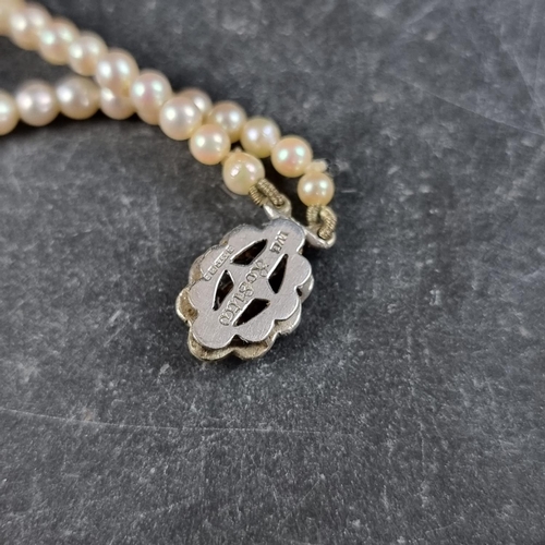 195 - A cased 'Rosita' cultured pearl necklace, having 9ct white gold clasp inset one diamond chip, 39cm.... 