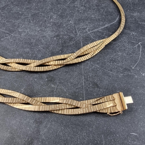 199 - A 9ct gold woven three strand bracelet and matching necklace, 18cm and 42cm respectively, import mar... 