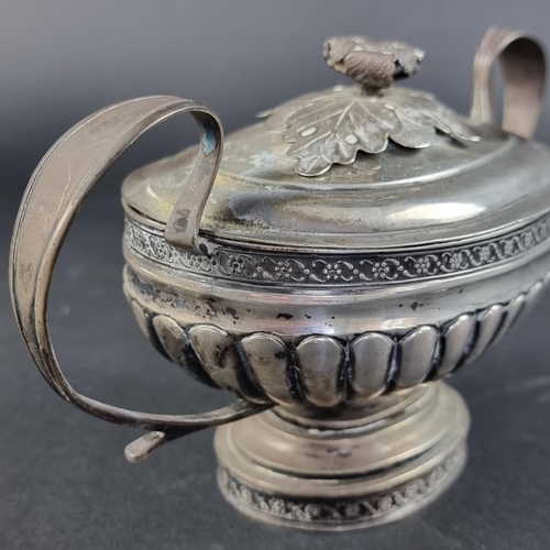 2 - An early 19th century German white metal oval lidded sugar bowl, maker C H M with 12 loth mark (.750... 