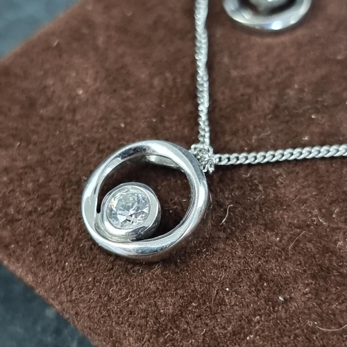 200 - A 9ct white gold pendant, set white stone; together with a matching pair of ear studs, gross weight ... 