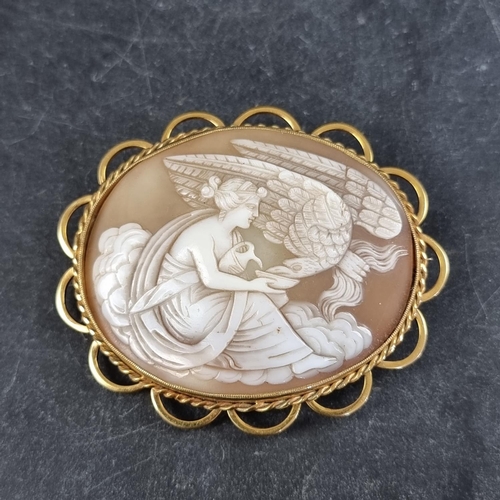 208 - A carved shell cameo brooch, in a yellow metal mount, stamped '9ct', the outer frame 61 x 51mm.... 