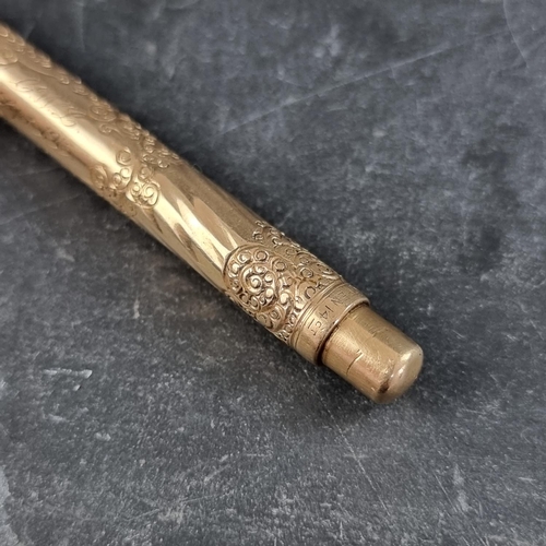 210 - An early 20th century Mabie, Todd & Co Ltd 'Swan' eyedropper ink pen, in the Wave Chased Double ... 