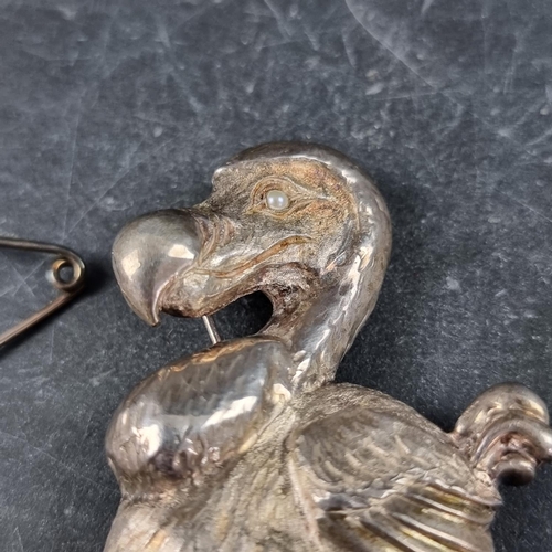 215 - A large silver novelty dodo brooch, having pearl set eye, by J R F, London 1992, 60mm high, gross we... 