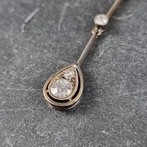 216 - A white metal diamond drop pendant, set four brilliant cut diamonds, the pendant is approximately 40... 