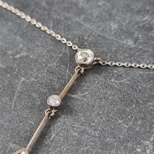 216 - A white metal diamond drop pendant, set four brilliant cut diamonds, the pendant is approximately 40... 