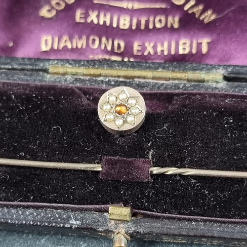 220 - A yellow metal stick pin, set old cut diamond, 6cm; together with another diamond set stick pin; and... 