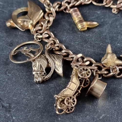 222 - A 9ct gold curb link bracelet, having padlock clasp, with thirteen attached gold charms, 50.7g.... 