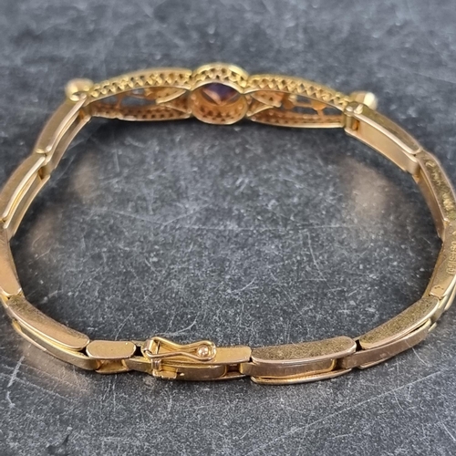 225 - An Edwardian yellow metal amethyst and seed pearl expanding bracelet, stamped '15ct', approximately ... 