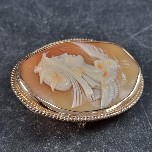 229A - A carved shell cameo, in 9ct gold mount, London 1990, 5cm high.