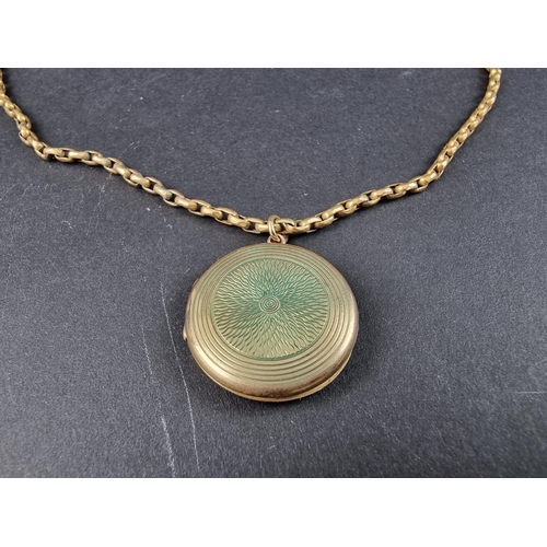 230A - A 9ct gold locket, 25mm, on yellow metal chain stamped 9ct, 43cm.