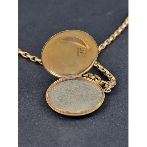 230A - A 9ct gold locket, 25mm, on yellow metal chain stamped 9ct, 43cm.