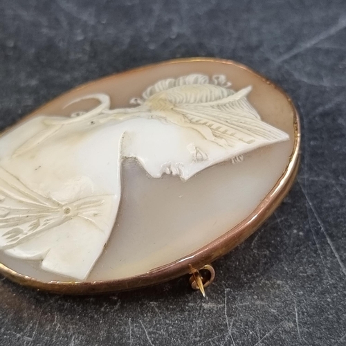 238 - A Grand Tour carved shell cameo brooch, in a yellow metal frame, 55mm x 45mm.