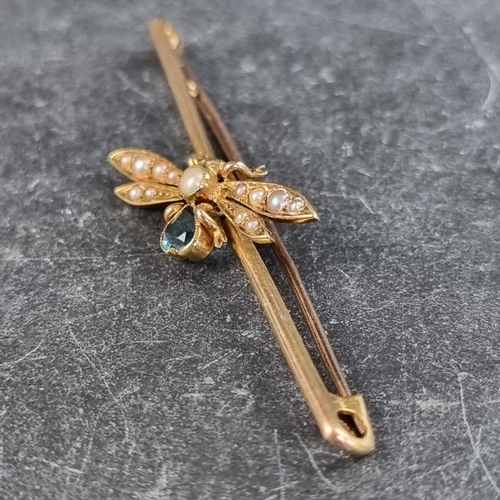 239 - An Edwardian yellow metal aquamarine and pearl fly bar brooch, set a heart shaped aquamarine and thi... 