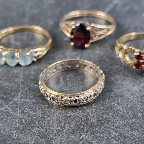 247 - Three 9ct gold gem set rings; together with a similar yellow metal gem set ring. (4)... 