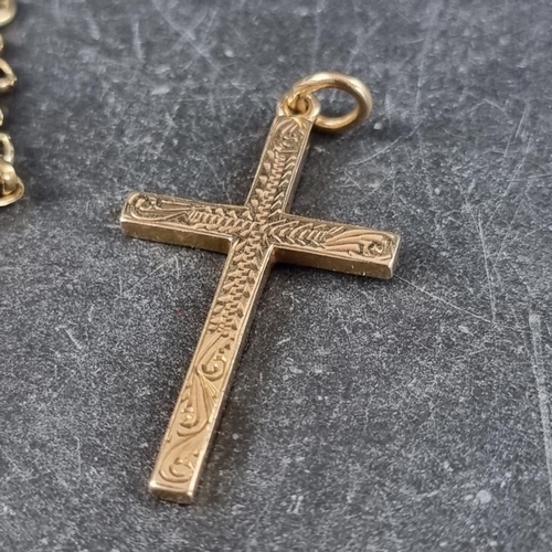 248 - A 9ct gold cross pendant, 26mm high, on a 9ct gold belcher chain, 80cm, 22g.